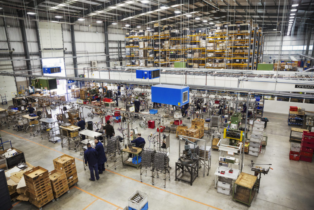 igh angle view over the factory floor and assembly process in a bicycle factory.